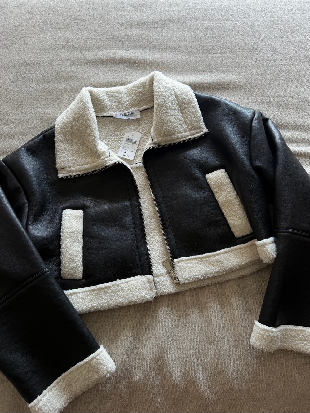 Cropped black jacket with white fur